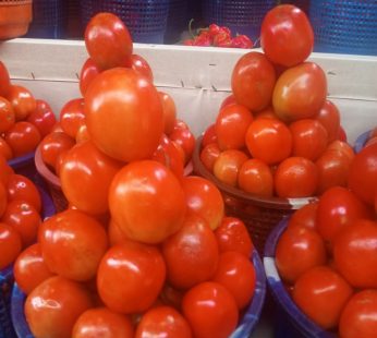 Half basket of tomatoes